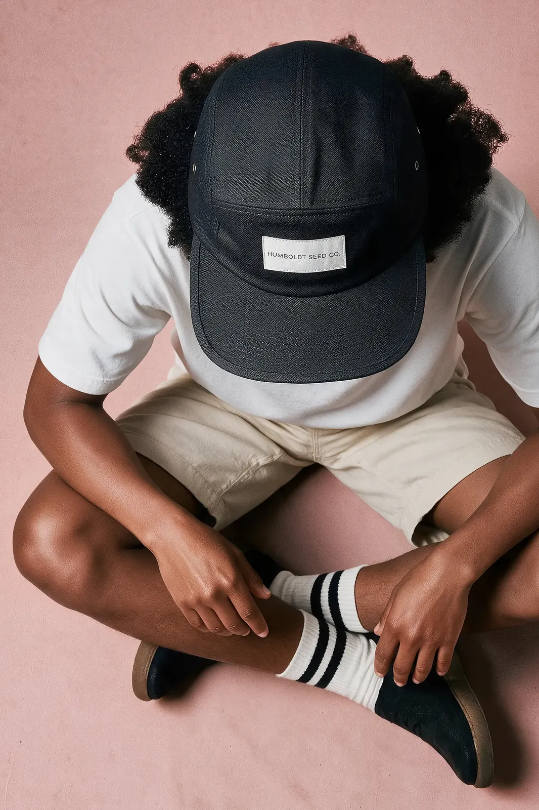Humboldt Seed Company 5-Panels Cap – black 5-panel cap, worn by a model